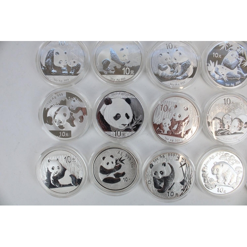 653 - Collection of twenty five Chinese Panda 10 Yuan 1 oz Ag .999 silver coins, all encapsulated, date ra... 