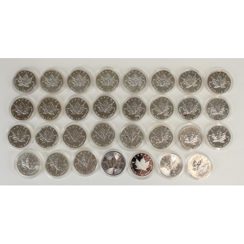 657 - Thirty one Canada 1oz fine silver $5 CAN maple leaf coins, date ranges 1988 through 2016 inc. 1999 t... 