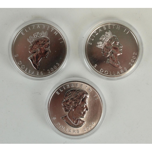 658 - Three Canada 1oz fine silver $5 CAN coins with enamel maple leaf decoration reverse