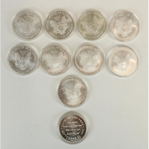 660 - Nine USA 9/11 World Trade Center related 1oz fine silver eagle .999 $1 USD coins with colour decorat... 