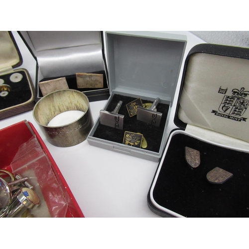44 - Hallmarked Sterling silver napkin ring, stamped 925, a large collection of novelty cufflinks includi... 