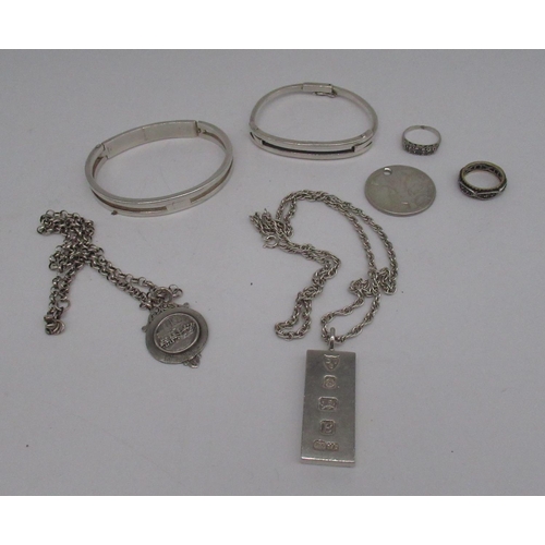 51 - Hallmarked Sterling silver ingot pendant on chain stamped Sterling, another hallmarked silver pendan... 