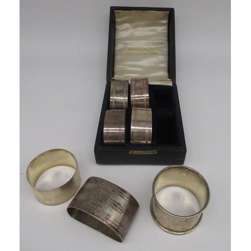 69 - Four Geo.V hallmarked sterling silver napkin rings engraved with initial R, by John Rose, Birmingham... 