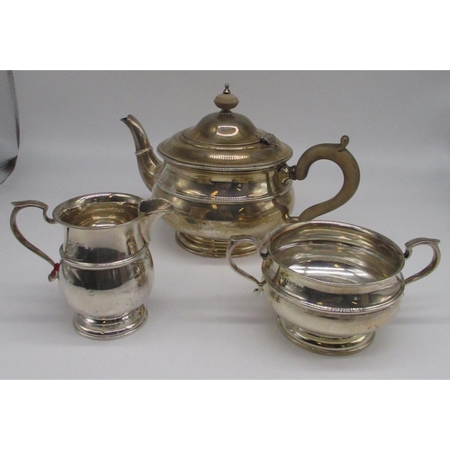 61 - Hallmarked Sterling silver part tea service including a teapot, milk jug and sugar bowl, by Adie Bro... 