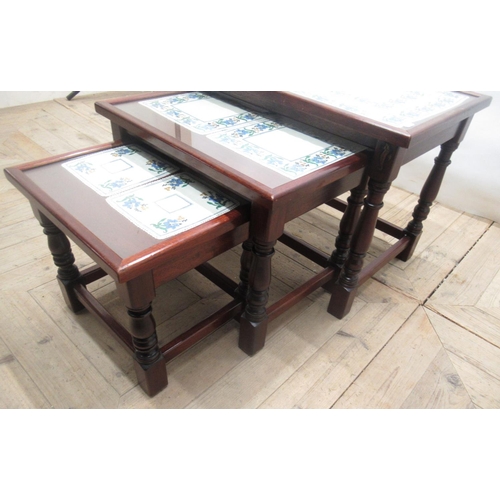 702 - Shaw & Riley Ltd, late c20th mahogany nest of 3 tables, with carved seahorse signature, and with ins... 