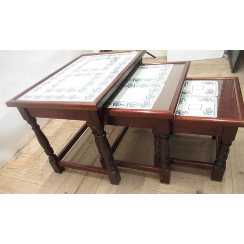 702 - Shaw & Riley Ltd, late c20th mahogany nest of 3 tables, with carved seahorse signature, and with ins... 