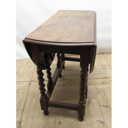 709 - c20th oak drop-leaf gateleg dining table, on barley twist columns, width(open) approx.120cm, width(c... 