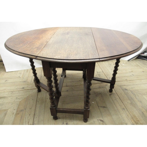 709 - c20th oak drop-leaf gateleg dining table, on barley twist columns, width(open) approx.120cm, width(c... 