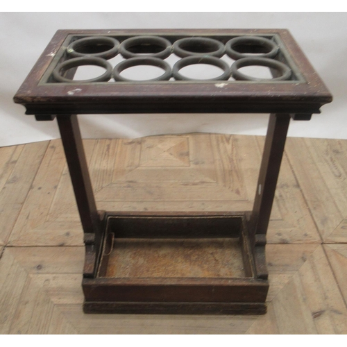 724 - Edwardian oak stick stand, with patinated brass eight stick divider and galvanised lift out tray, wi... 