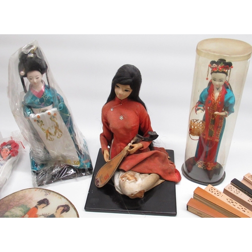 183 - 3 Oriental dolls, 3 Spanish style dolls and a small collection of Oriental fans