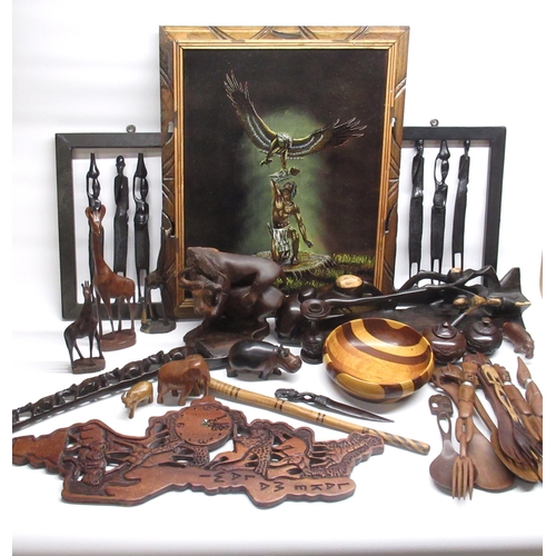 184 - Selection of African tribal wood figures and carvings inc. a wall clock from Lake Malawi, a lion att... 