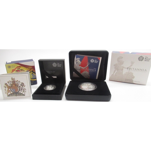 290 - Royal Mint 'The Britannia' 2016 UK One Ounce Silver Proof Coin, and a Royal Mint 'A Heraldic Celebra... 