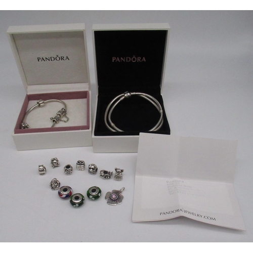 38 - Pandora charm bracelet with safety chain, a matching necklace, both stamped ALE 925, and a collectio... 