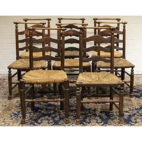 736 - Set of eight C19th country made ash and elm rush seat ladderback dining chairs, with curved turned t... 