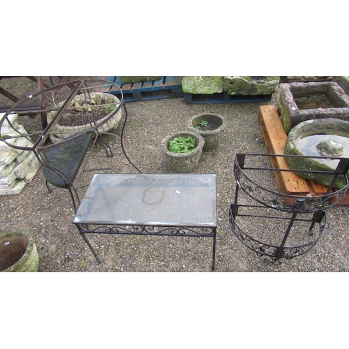 784 - Conservatory table with glass top and metal legs, a half-moon two-tiered planter with flower and scr... 