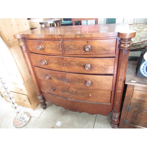 788 - Victorian mahogany bow front chest of two short and three long drawers, on turned feet, W135cm D52cm... 