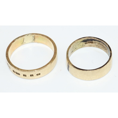 13 - Two 9ct hammered yellow gold wedding bands, both stamped 375, sizes W1/2 and Q1/2, gross 10.1g