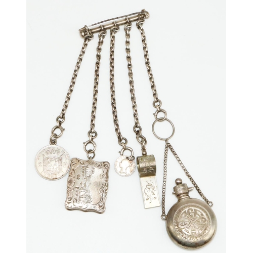92 - White metal chatelaine, with attached Victorian hallmarked Sterling silver vinaigrette, the central ... 
