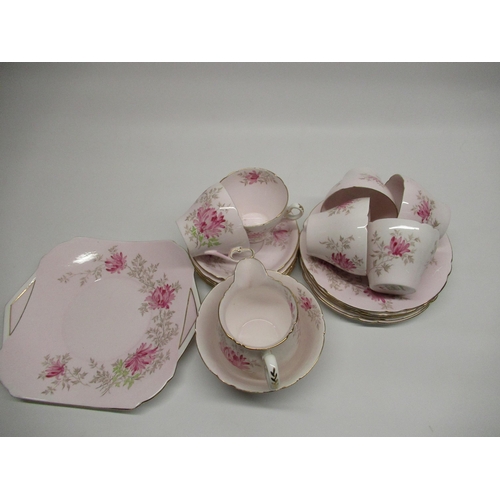 247 - 1930's Shelley 21 piece tea set, blush pink ground with hand painted floral decoration, makers mark ... 