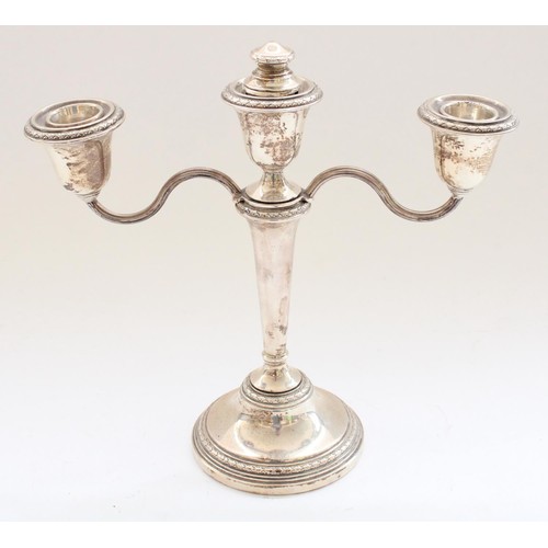 59 - ERII hallmarked silver three branch candelabra with detachable S shape arms on trumpet body and step... 