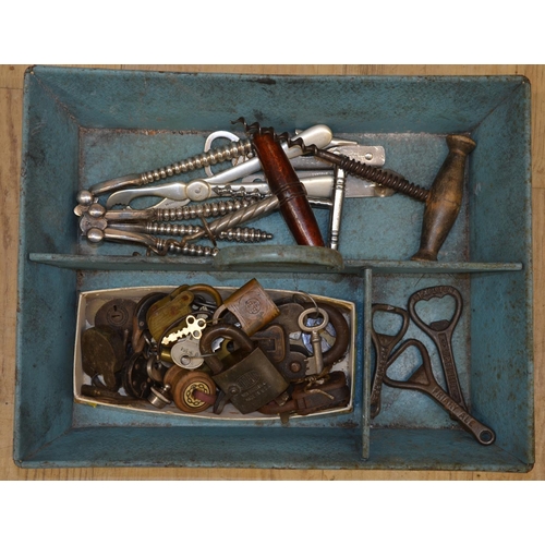 693 - Collection of vintage padlocks with keys, corkscrews, nutcrackers, bottle openers in metal carrying ... 