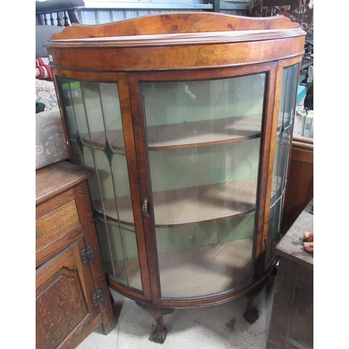 796 - 1930s walnut demi lune display cabinet, single glazed door, flanked by leaded glazed panels, two she... 