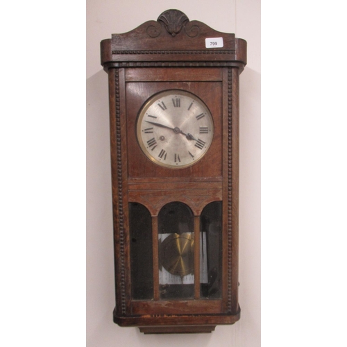 799 - 1930s H.A.C. oak cased wall clock, half glazed panel door enclosing brass bezel and silvered dial, 2... 