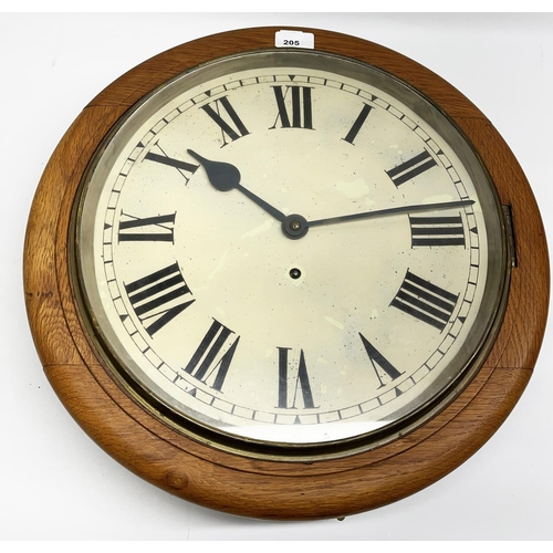 205 - Early C20th dial clock, golden oak case with brass bezel enclosing painted metal Roman dial, with ou... 