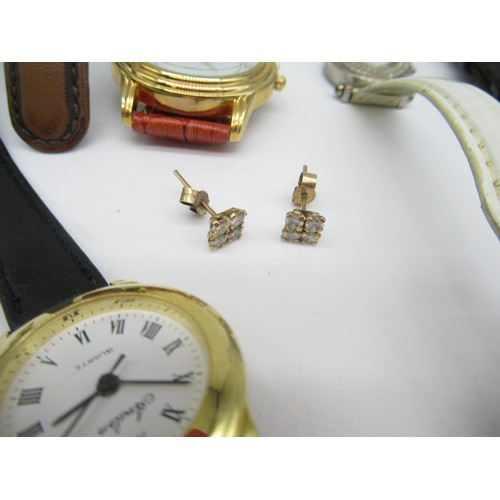 49 - Pair of diamond earring studs, four round cut diamonds claw set on yellow metal mounts, gross 0.9g a... 
