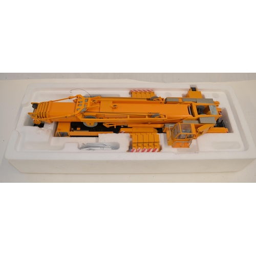 Boxed 1/50 scale diecast Demag AC 500-1, yellow Schmidbauer KG