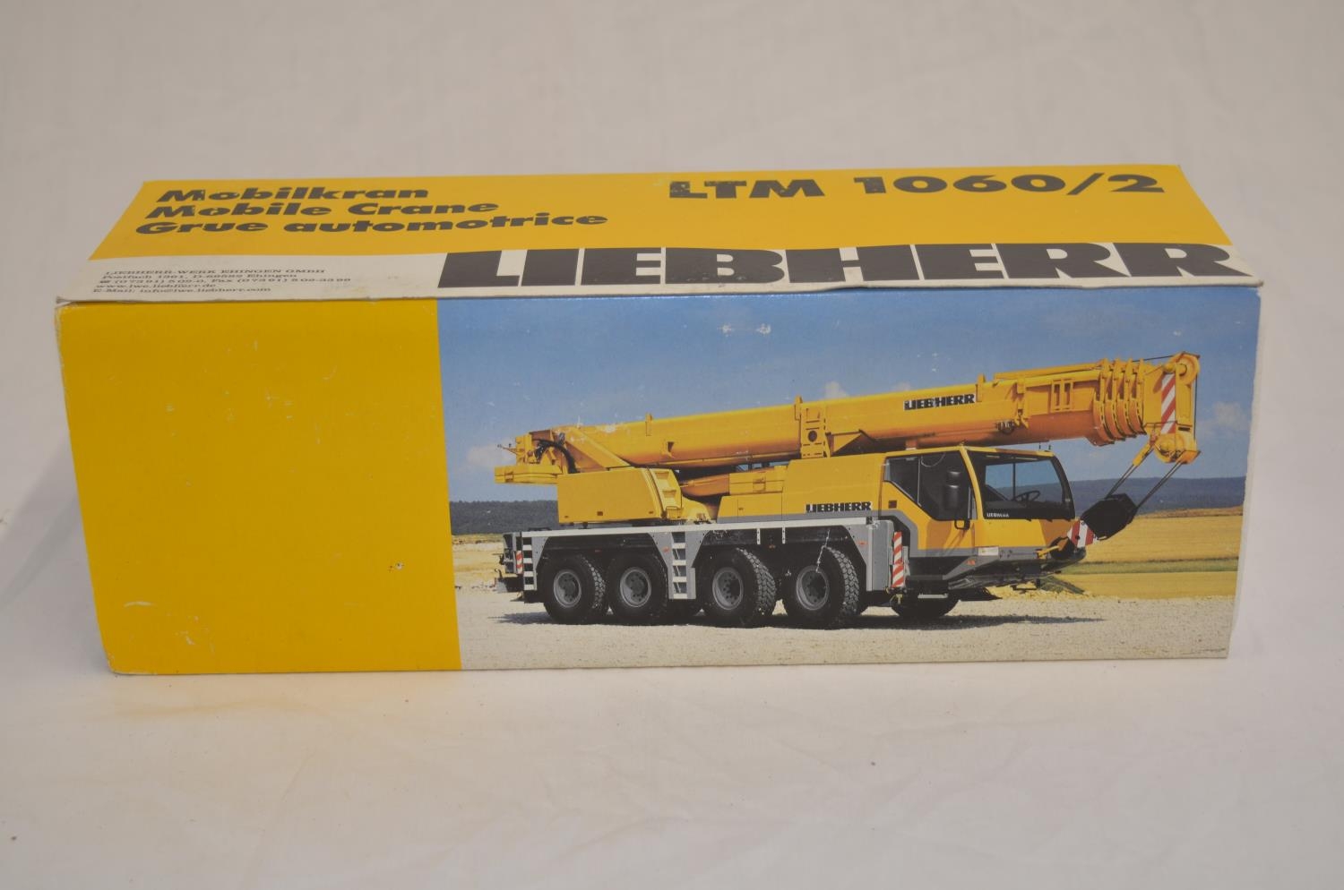 Boxed 1/50 scale diecast Grove TM 1500 mobile telescopic
