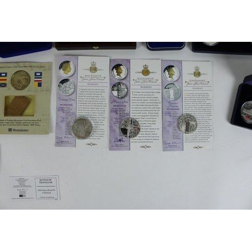 751 - Selection of mixed silver proof coins to include Nelson 2005 crown, Battle of Trafalgar £5, ERII Gol... 