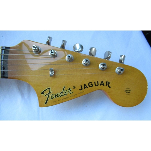 85 - Fender Jaguar 6 string electric guitar, in sunburst finish, made in Japan, serial no. T008586, with ... 