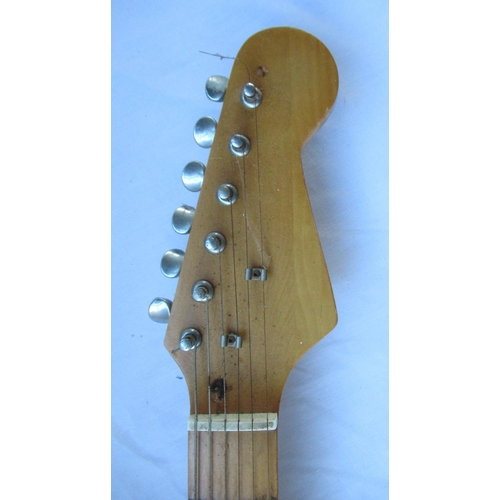 90 - Unnamed Fender type 6 string electric guitar, in sunburst finish with ivory scratch plate (A/F)