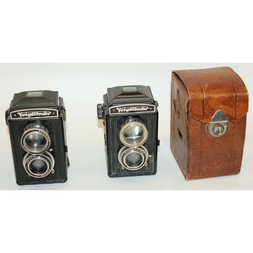 235 - Voightlander Brilliant Bakelite bodied cameras, one in original leather case, serial nos. 3902358 an... 