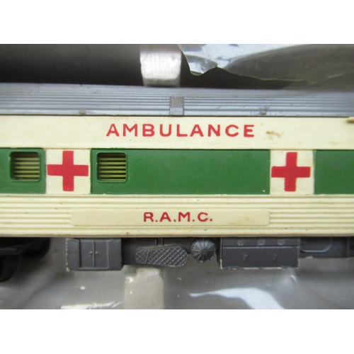 68 - Various carriages and trains by Hornby and Tri-ang including boxed ambulance carriage with ramc Elec... 