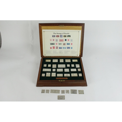 698 - The Stamps of Royalty - cased set of twenty five sterling silver replica stamps, together with eight... 