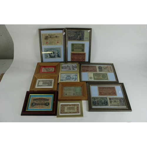 700 - Collection of framed and glazed world bank notes, to include early German Reichsbanfnotes, East Afri... 