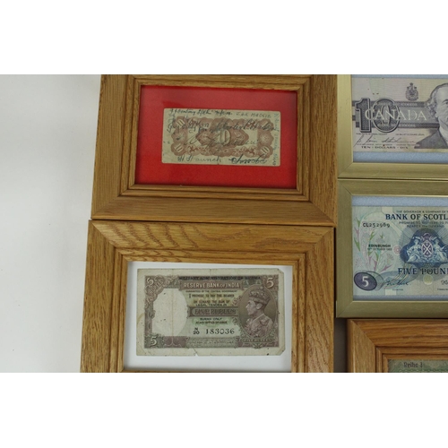 700 - Collection of framed and glazed world bank notes, to include early German Reichsbanfnotes, East Afri... 