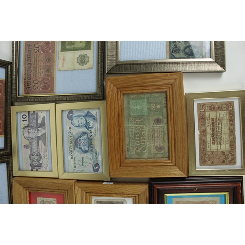 700 - Collection of framed and glazed world bank notes, to include early German Reichsbanfnotes, East Afri... 