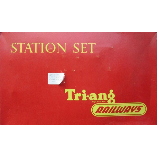 71 - Boxed triang station set, including station and staircase.