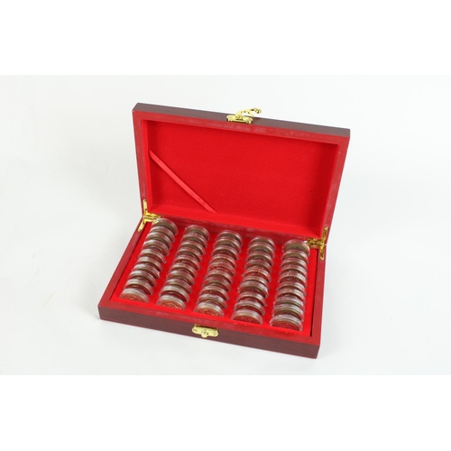 710 - 50 collectable £2 coins, all encaspulated in fitted box