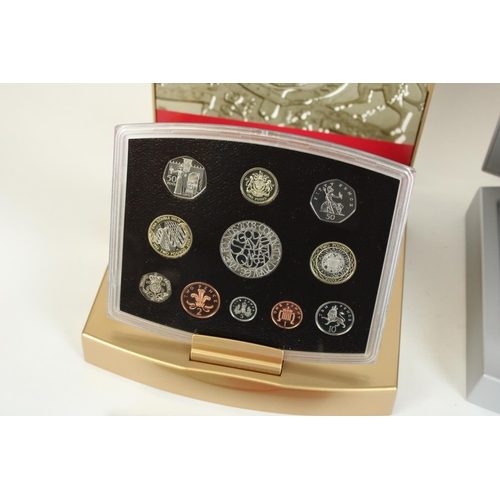 717 - Royal Mint UK 2000 executive proof set, 2003 executive proof set and the 2004 proof coin collection,... 