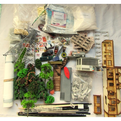 80 - Collection of diorama figures and vehicles, people, pylons, trees, paper scenery moulding powder and... 