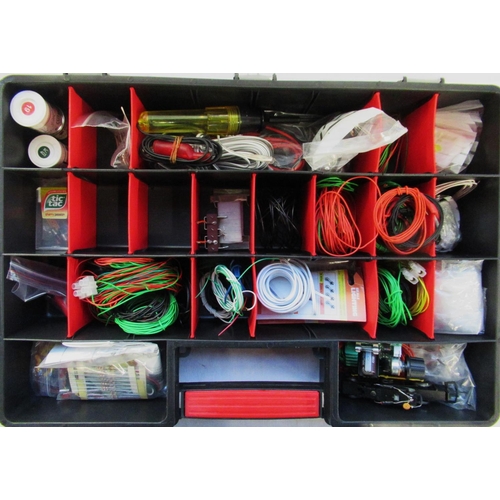 82 - Cased collection of electrical components, wires, chaser lights, electric tester, circuit boards etc... 