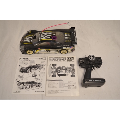 A 1/10 scale Mugen Seiki MTX-3 nitro powered radio control car