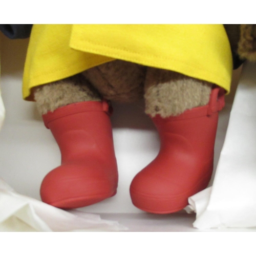 131 - R. John Wright Dolls Inc. Rainy Day Paddington, H38cm, limited edition 42/2500, with certificate in ... 