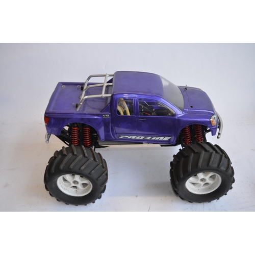 315 - Large Pro-Line 4WD nitro powered off road radio control car. Approx length 49cm.