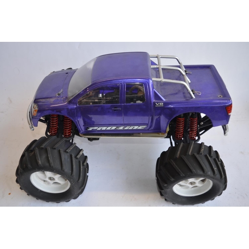 315 - Large Pro-Line 4WD nitro powered off road radio control car. Approx length 49cm.