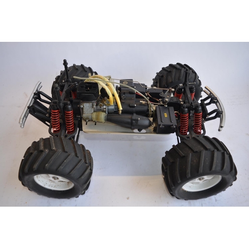 315 - Large Pro-Line 4WD nitro powered off road radio control car. Approx length 49cm.